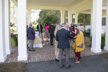 Guests mingling in a patio