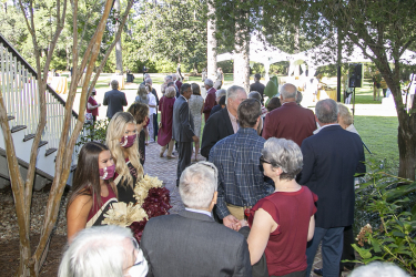 A crowd of guests outside of the pavilion